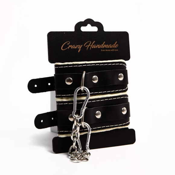 Черные скругленные наручники с мягкой бежевой подкладкой Черные скругленные наручники с мягкой бежевой подкладкой